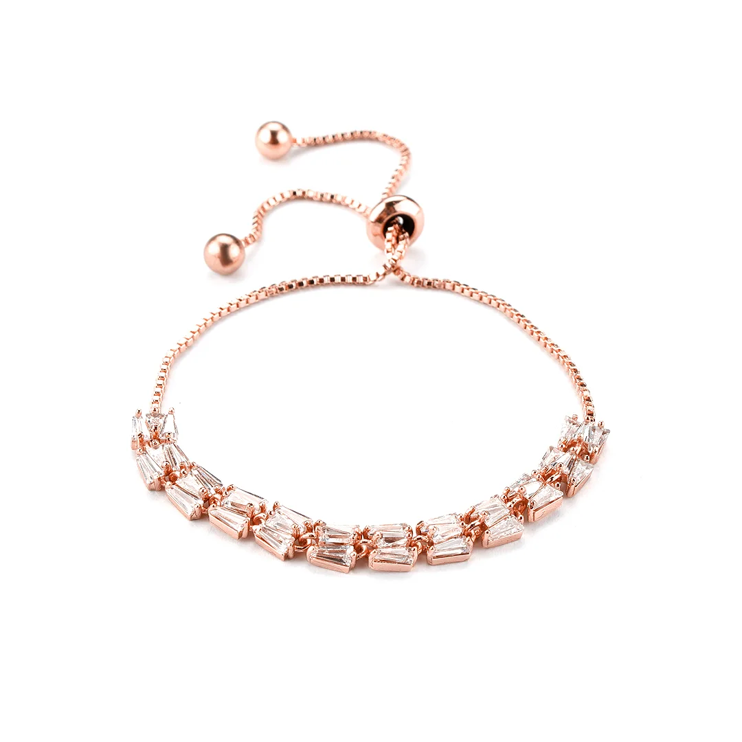 Bracelet ton or rose à cristaux baguette