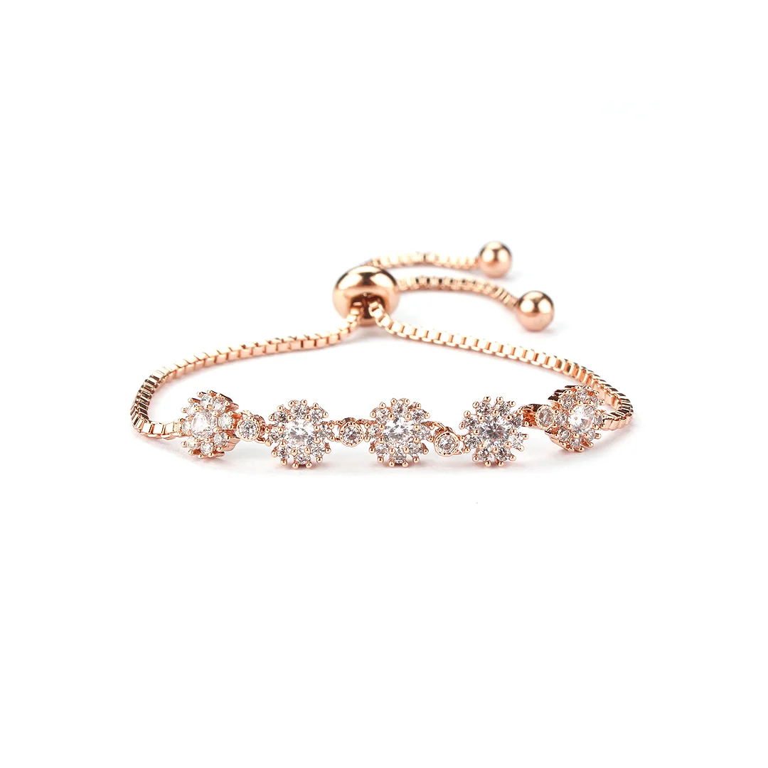 Bracelet floral ton or rose à cristaux