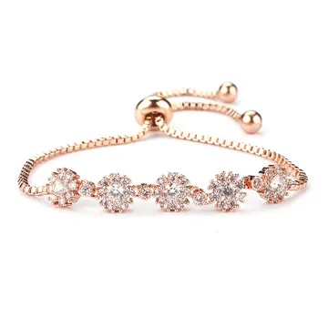 Bracelet floral ton or rose à cristaux