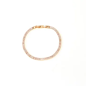 Bracelet ton or rose à ligne de cristaux