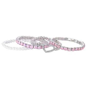 Ensemble à superposer de bracelets à cristaux roses