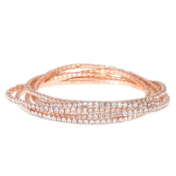 Ensemble de bracelets aux tons roses à superposer